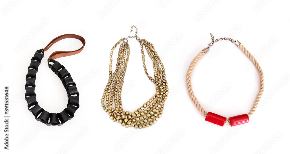 Golden necklaces isolated on a white background Golden necklaces isolated on a white background