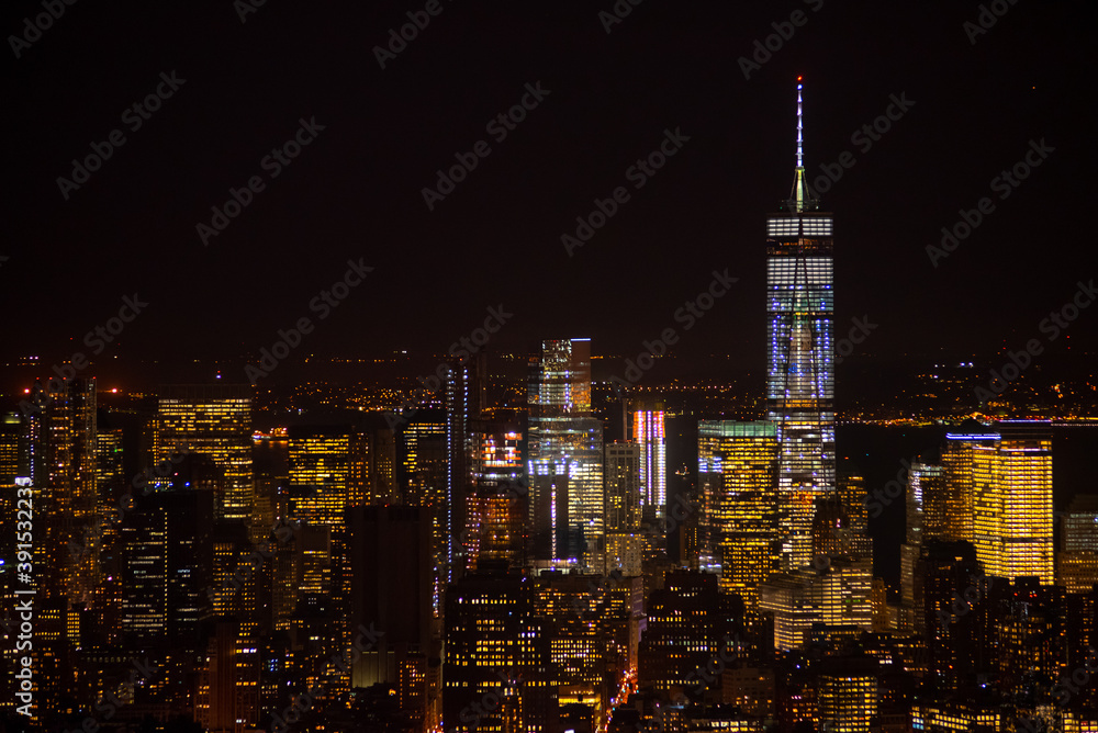 Fototapeta premium Amazing autumn sunset view from One World Trade Center sky scraper in New York to South Manhattan with great colors