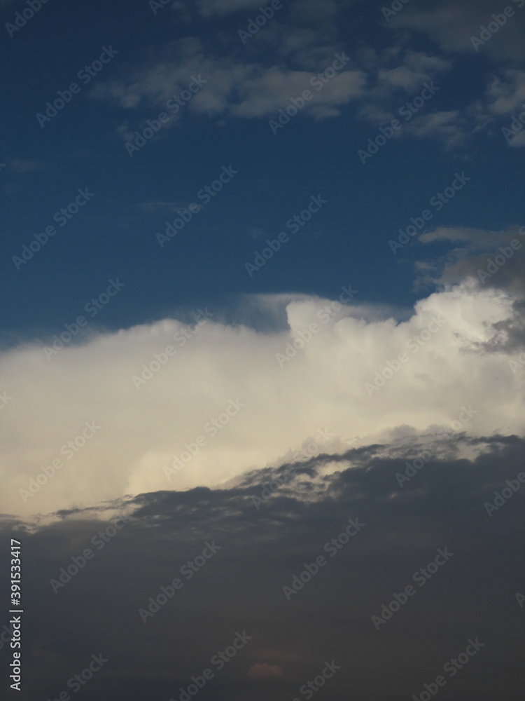 Fototapeta premium Beautiful multi-colored sky with a cloud before a thunderstorm and rain in autumn in Israel close-up. The photo can be used as a banner for advertising. There is room for text.