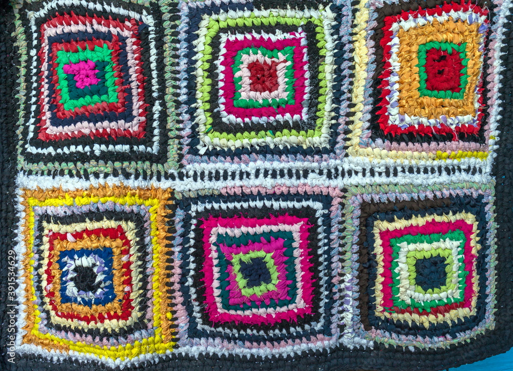 Crocheted by hand from strips of fabric rugs closeup Crocheted by hand from strips of fabric rugs closeup