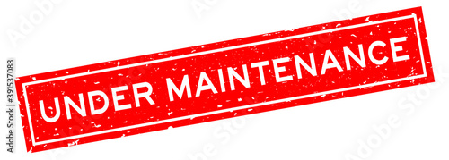 Grunge red under maintenance word square rubber seal stamp on white background