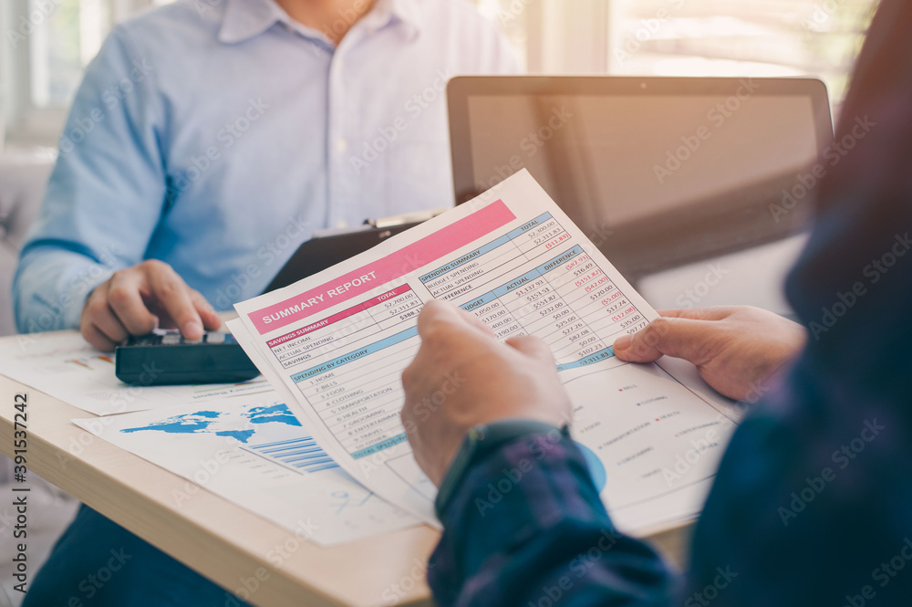 The teamwork of business people analysis cost graph and Idea presentation, analyze plans on the desk at the meeting room The teamwork of business people analysis cost graph and Idea presentation, analyze plans on the desk at the meeting room