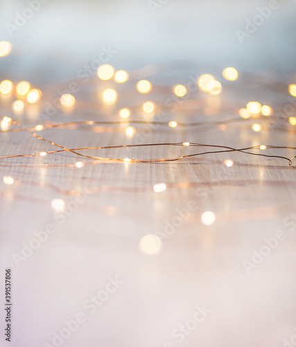 Christmas lights on background with copy space. Decorative garland
