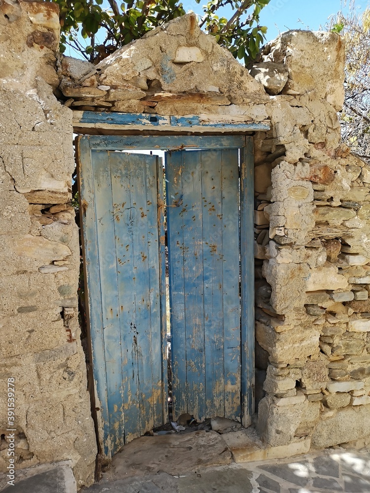old vintage door in a village on the island of Naxos, Greece