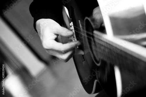 musician playing the guitar