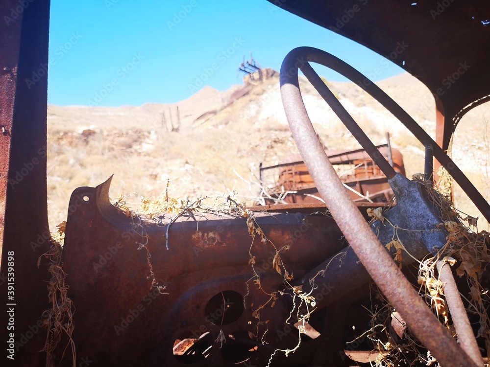 rusty truck wreck on the old mining island of Serifos, Greece