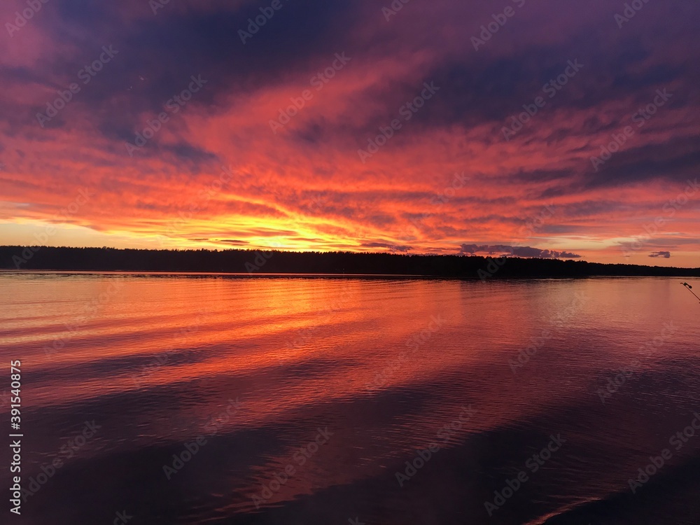 Fototapeta premium sunset over the lake