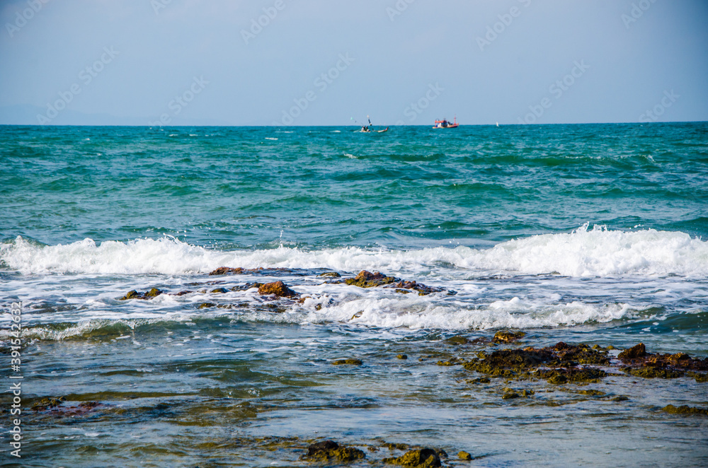 Ocean waves breaking on the rocks on the shore. Ocean waves breaking on the rocks on the shore.