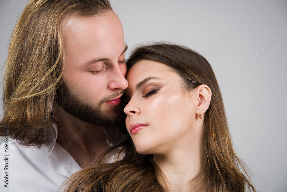 Couple in love. Relationships concept. Close up portrait of kissing couple. Woman and man closeup. Couple in tender passion. Sensual relationships. Valentines day.