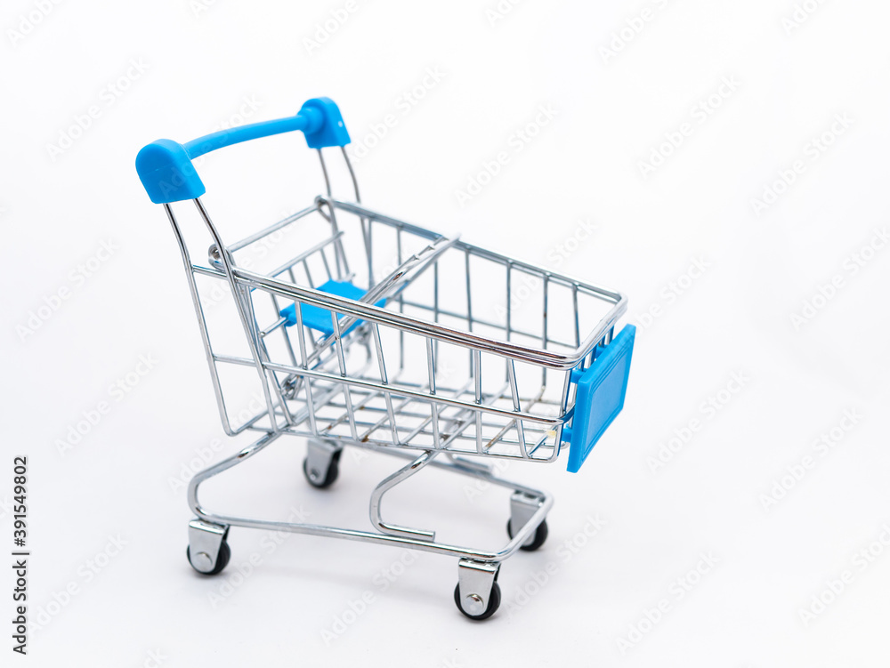 Mini empty grocery cart isolated on white background