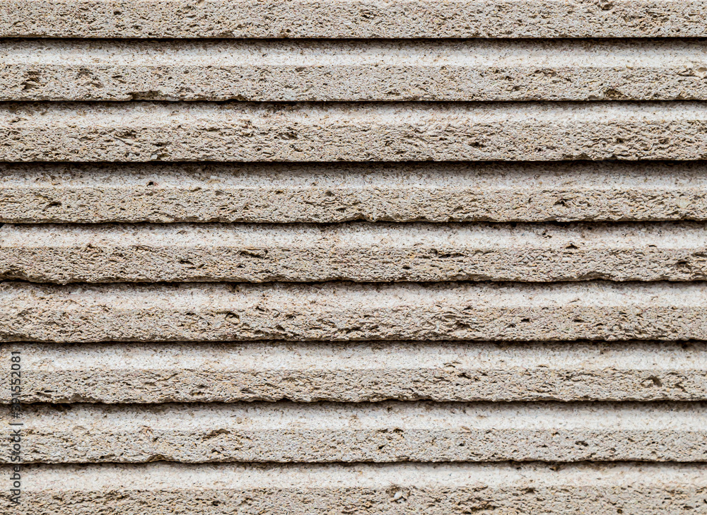 Building material travertine in a stack as abstract background Building material travertine in a stack as abstract background