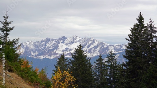 beautiful view in the morning to the snow capped alps in austria in autumn