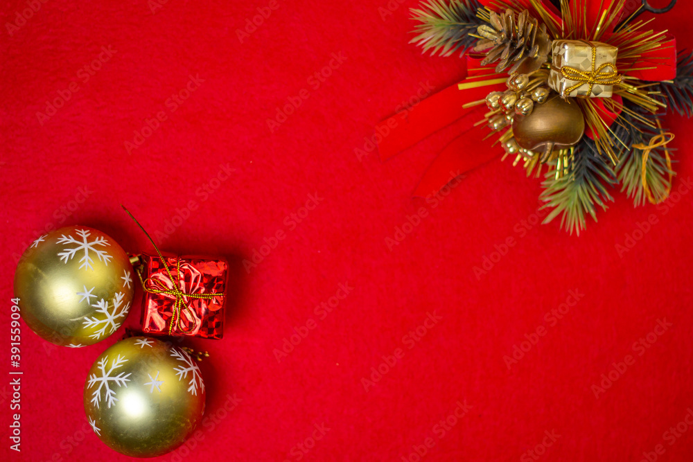 Christmas decorations on a red background. Holiday decorations. Christmas concept. There is a place for an inscription or logo