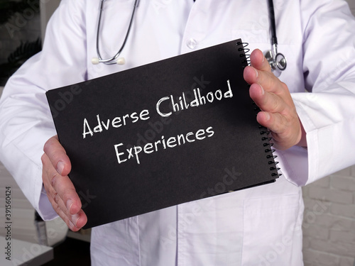 Medical concept about Adverse Childhood Experiences with phrase on the sheet. photo