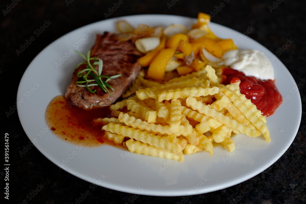 roasted steak with french fries and paprika roasted steak with french fries and paprika