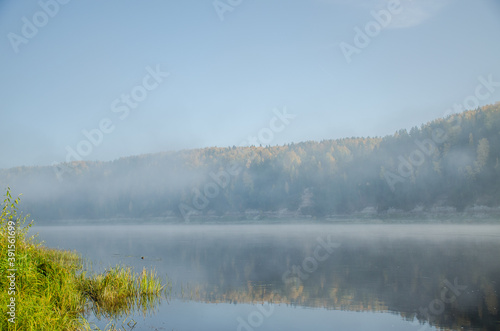 Thick fog on the river Bank © sachurupka18