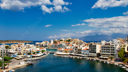 Fototapeta Naklejka Na Ścianę i Meble -  View of the bay of Agios Nikolaos with the famous port and buildings