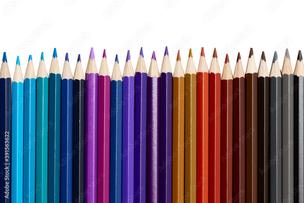 Many colorful pencils in a row isolated on white background. Many colorful pencils in a row isolated on white background.