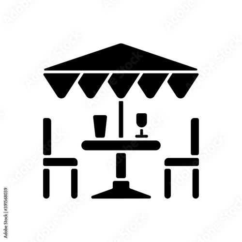 Patio furniture and accessories black glyph icon. Outdoor lounge furniture. Patio umbrellas. Comfortable outdoor living space. Silhouette symbol on white space. Vector isolated illustration