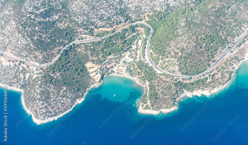 Aerial view over Kargacik koyu bay in Ahmetbeyli coastal resort town in Menderes district of Izmir province in Turkey.