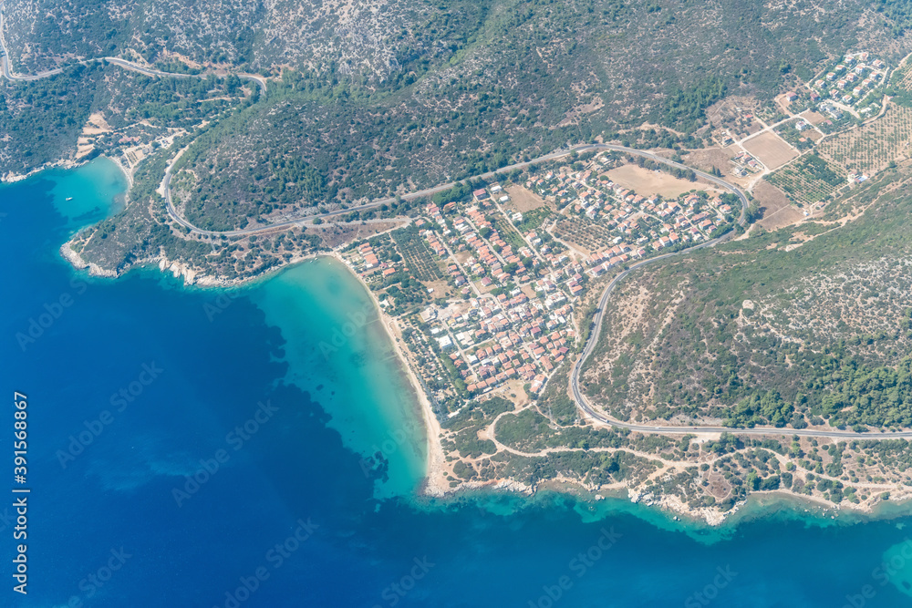 Aerial view over Ahmetbeyli coastal resort town in Izmir province in Turkey.