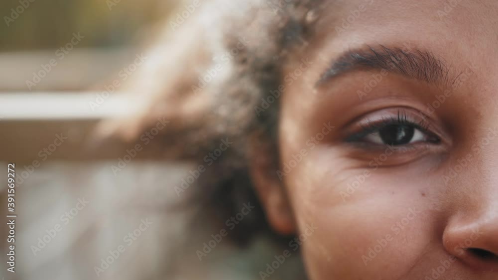 Close up macro Eyes of a black woman, african american woman portrait, mix raced young female, student teenager generation z Close up macro Eyes of a black woman, african american woman portrait, mix raced young female, student teenager generation z