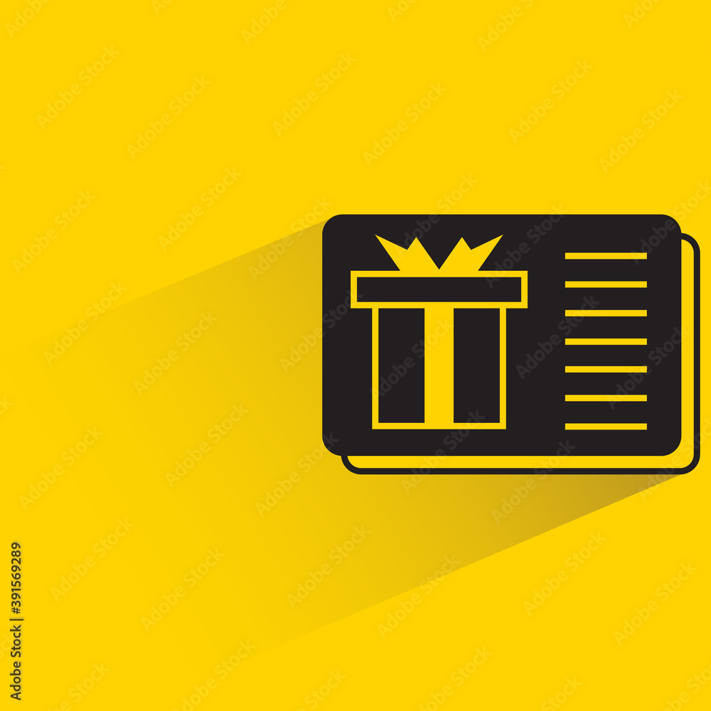 gift voucher drop shadow on yellow background