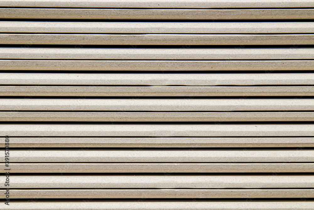 Texture background. A stack of moisture-resistant drywall sheets at a hardware store. Concept repair of an apartment or house Texture background. A stack of moisture-resistant drywall sheets at a hardware store. Concept repair of an apartment or house