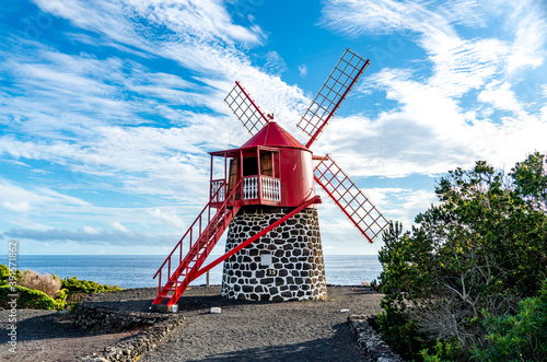 Bild auf Leinwand Azores, the Island of Pico, beautiful restored windmill in the location of Sao J