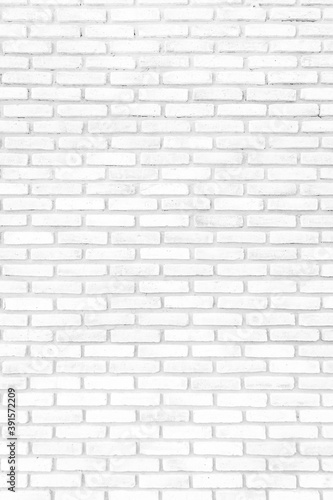 White brick walls that are not plastered background and texture. The texture of the brick is white. Background of empty white tile ceramic wall.