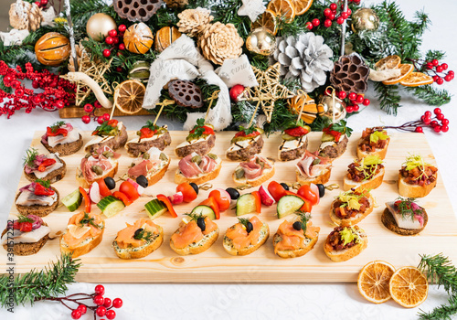 Fototapeta Naklejka Na Ścianę i Meble -  Christmas appetizers on the table