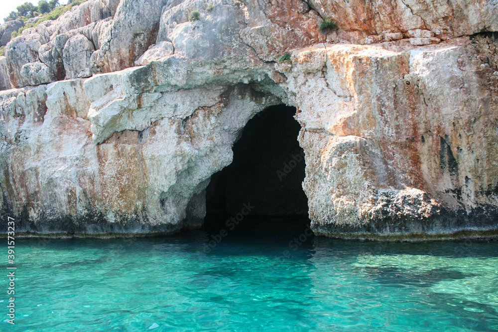 Fototapeta premium cave in the blue sea