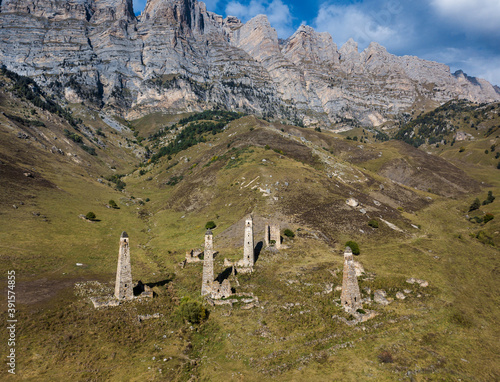 Aerial view of medieval ancient stone battle tower complex in the mountains of Ingushetia, Russia