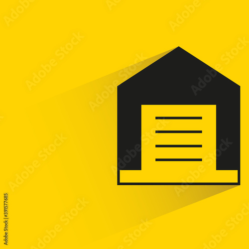 garage with shadow on yellow background