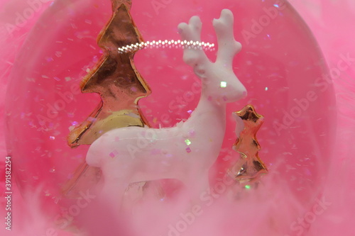 reindeer and pine trees and pink otrish photo