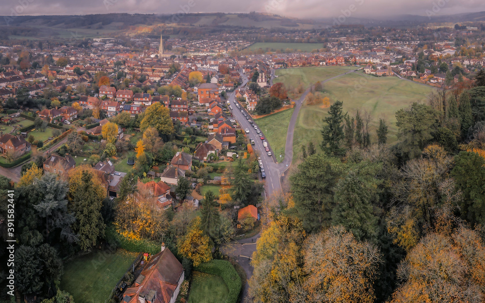 Aerial view of streets of houses in beautiful rural English market town
