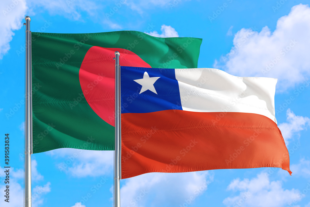 Chile and Bangladesh national flag waving in the windy deep blue sky. Diplomacy and international relations concept. Chile and Bangladesh national flag waving in the windy deep blue sky. Diplomacy and international relations concept.