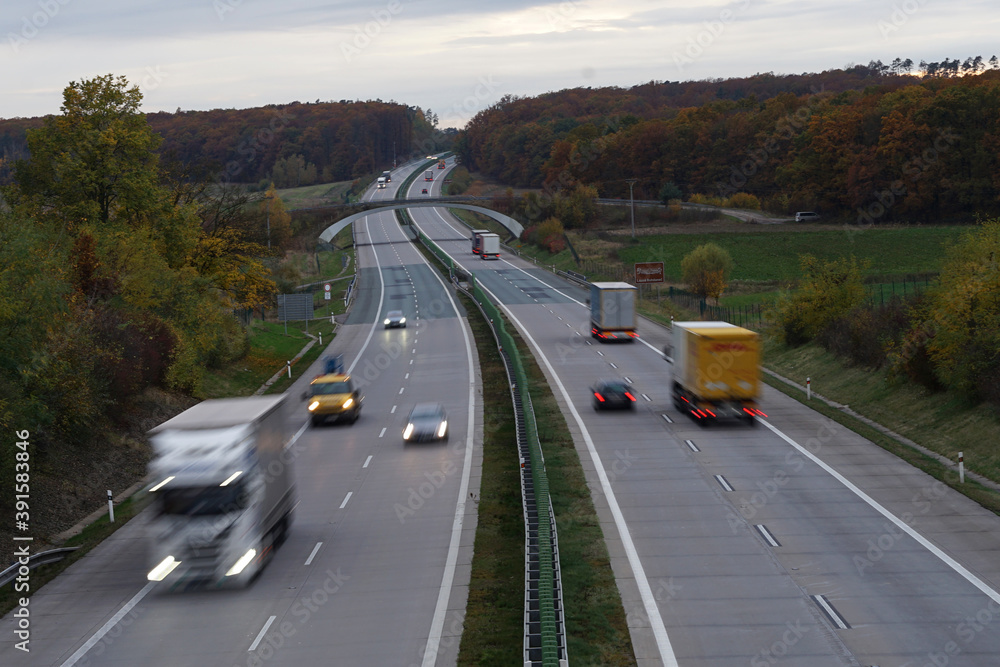 Modern motorway D11 aerial view with blurred cars and trucks, Czech Republic