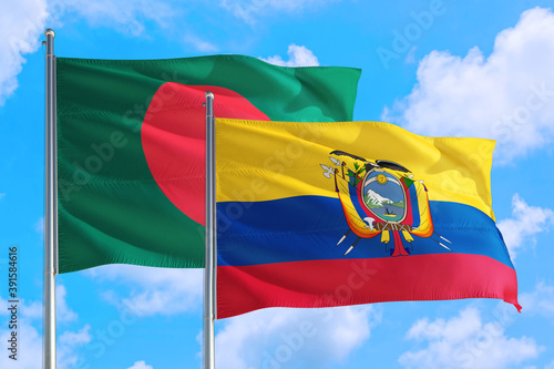 Ecuador and Bangladesh national flag waving in the windy deep blue sky. Diplomacy and international relations concept.