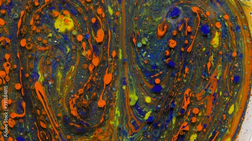 beautiful colored abstract background of moving and mixing liquid paints on water surfacered, painted texture. Multicolored acrylic paint.ed acrylic paint.