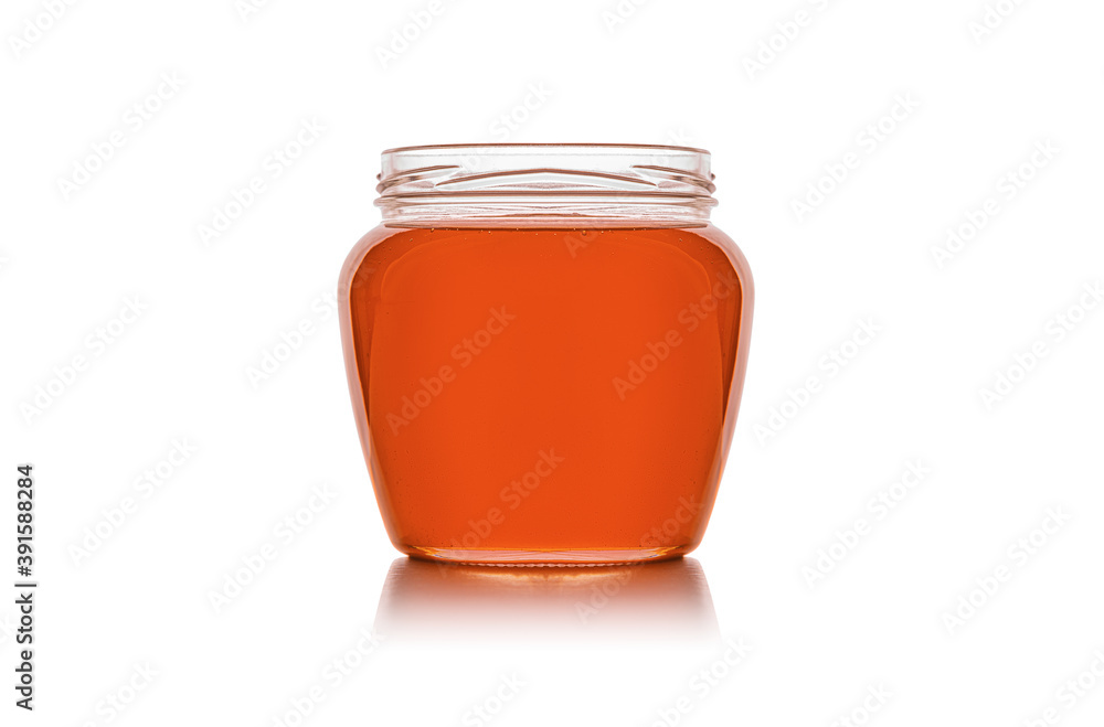 Jar with honey isolated on white background. Jar with honey isolated on white background.