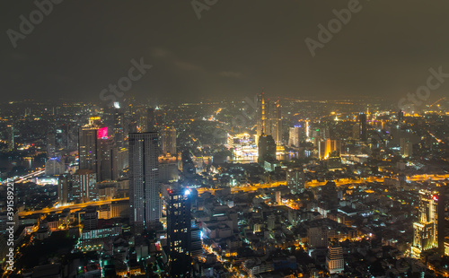 Bangkok, thailand - Nov 07, 2020 : Bangkok downtown cityscape with skyscrapers at night give the city a modern style. No focus, specifically.
