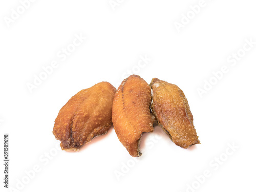 Fotografie The close up of deep fried fish (Nile Tilapia fish) Thai food on white background