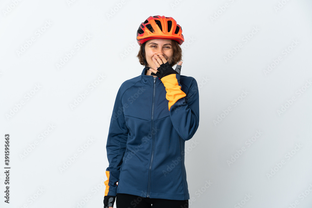 Young English cyclist woman isolated on white background happy and smiling covering mouth with hand Young English cyclist woman isolated on white background happy and smiling covering mouth with hand
