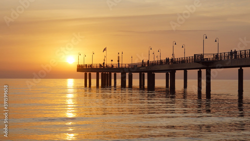 pier in a yellow sunset