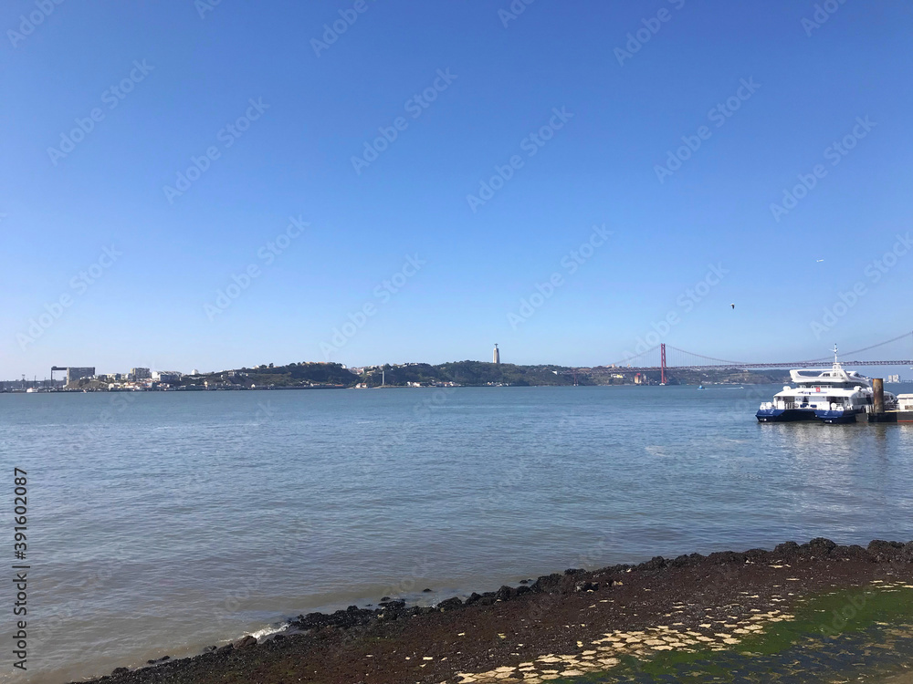 Fototapeta premium view of the Tagus River near Cais das Colunas in Lisbon, Portugal