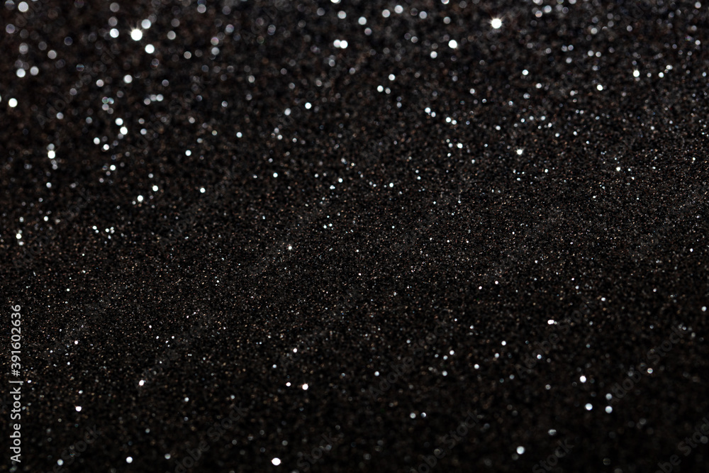 Black glitter textured patterned background Black glitter textured patterned background