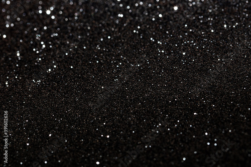 Black glitter textured patterned background