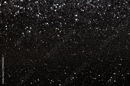 Black glitter textured patterned background
