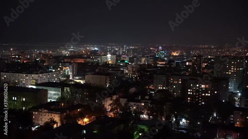 Wallpaper Mural shooting from above. night city with lights Windows of houses in neighborhoods. Torontodigital.ca